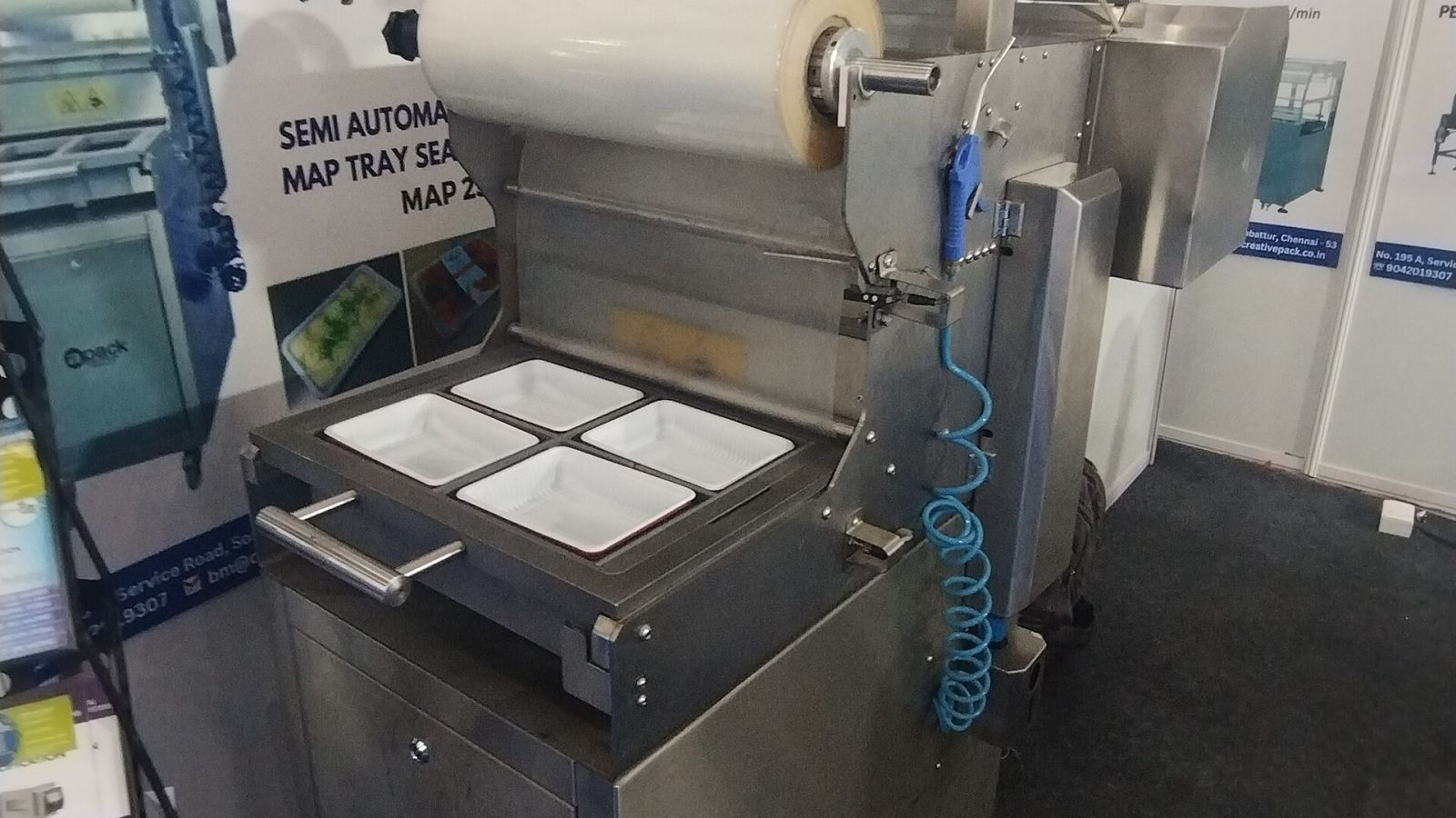 Semi-automatic tray sealer at exhibition